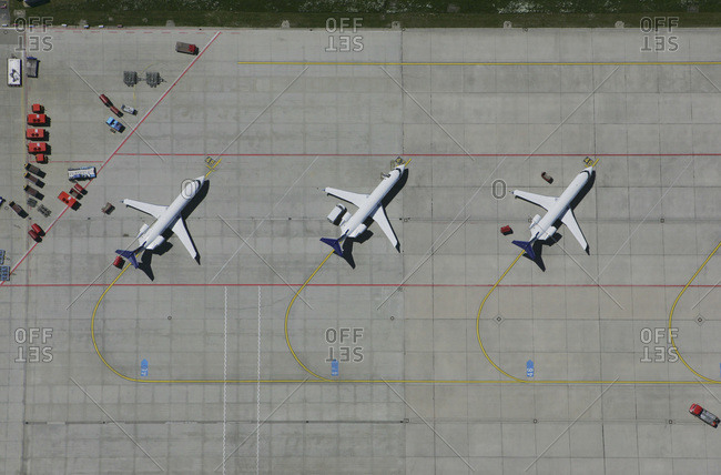 Aerial view of a row of airplanes parked