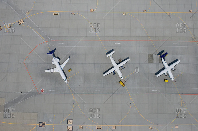 Aerial view of three parked airplanes