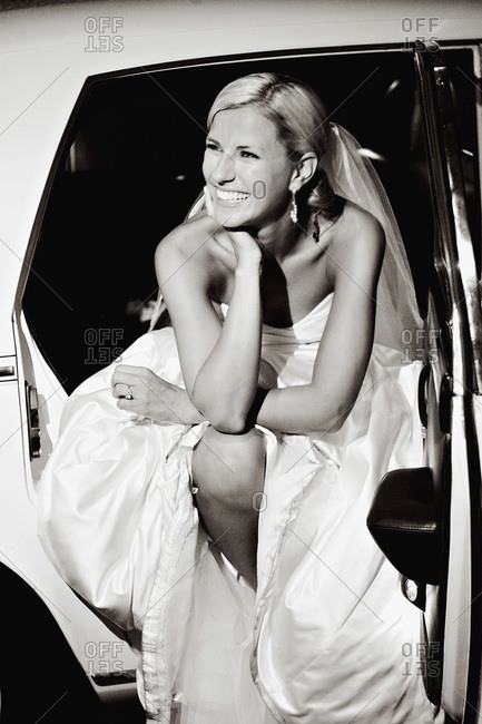 Bride getting out of a limousine