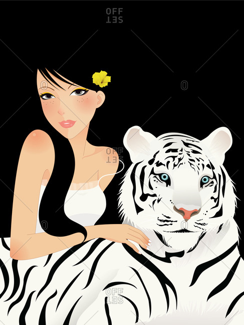 A woman relaxing with a pet tiger