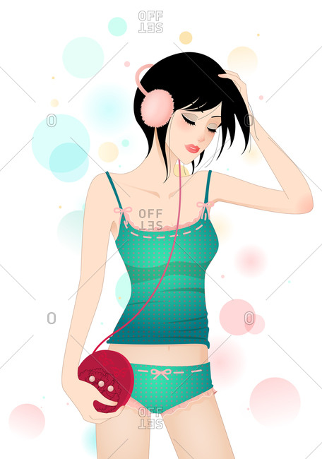Young woman listening to music in her pajamas