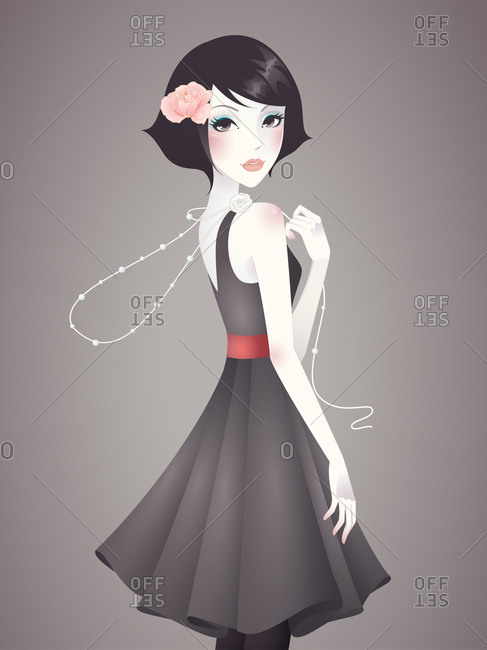 A fashionable young woman in a flowing dress