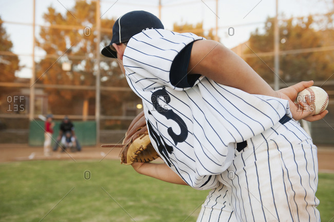 USA, California, Ladera Ranch, boy (10-11) playing baseball