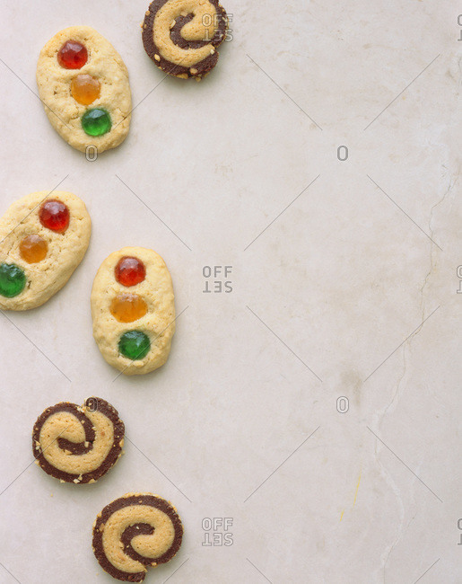 Decorated cookies on a light background from above