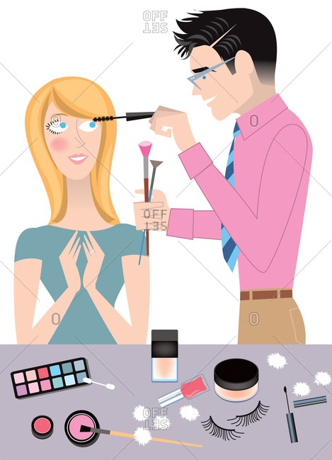 Young woman getting makeup