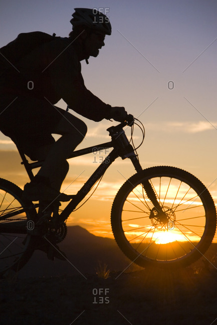 Mountain biking at sunset in California