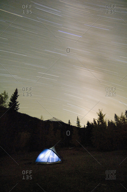 Camping under star trails in Colorado