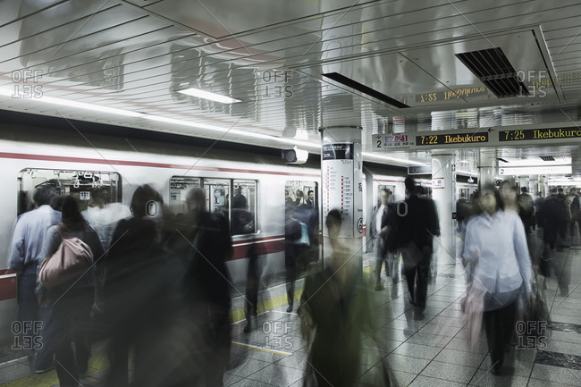 Blurred image of people in subway