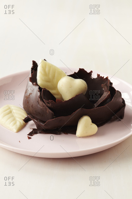Chocolate flake boat with white chocolate hearts and leaves.
