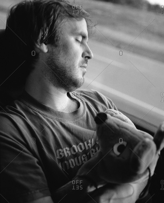Man sleeping on a bus, Sweden