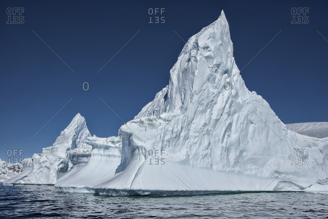 Massive iceberg formations floating offshore of the ice sheet of Antarctica