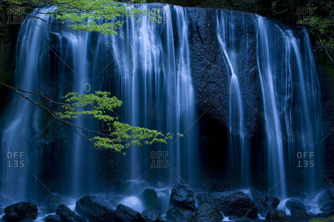 The Tatsusawa Falls photos at dusk with sprint leaves in Fukushima Prefecture, Japan.
