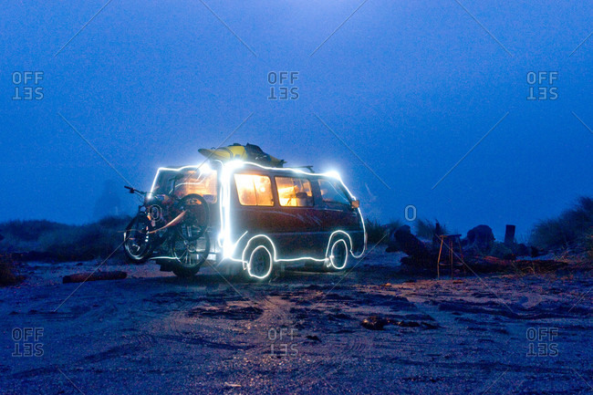 Light painting of a camper van on a beach o the West Coast New Zealand