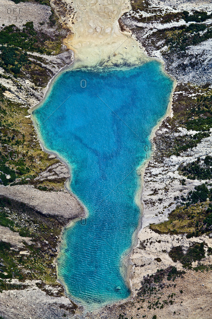 A lake fills with mineral-rich turquoise water from a glacier run-off.