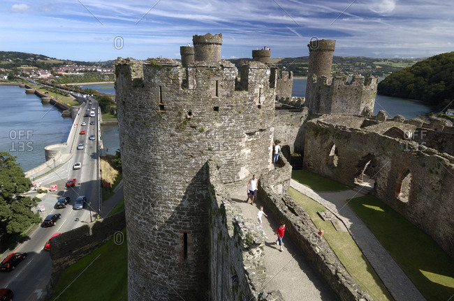 Medieval Conway Castle overlooks a modern day roadway