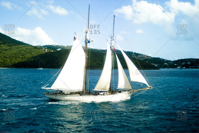 Side-view of a schooner on the sea