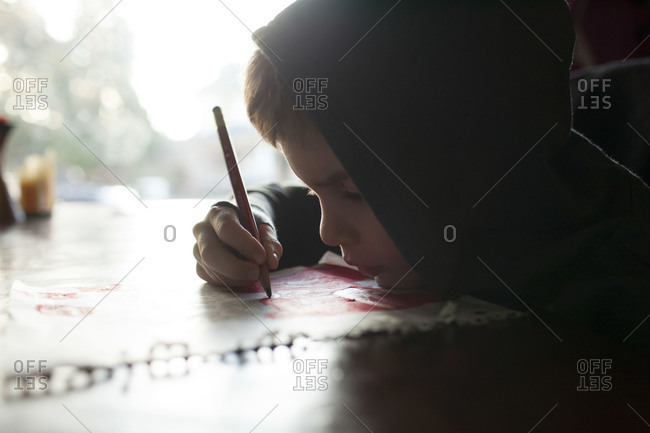 Closeup of child drawing on table