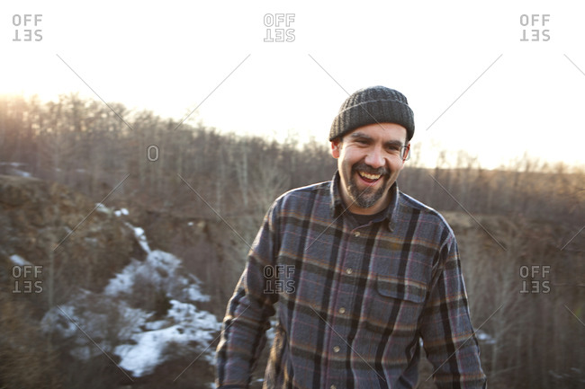 portrait of a man in a plaid flannel