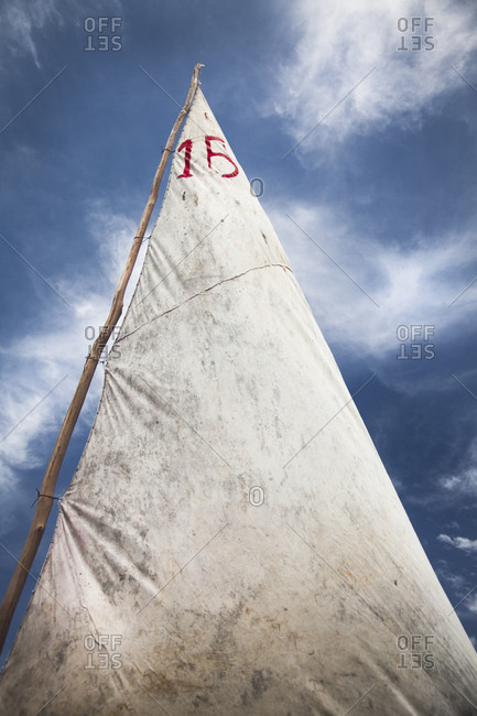 White sail against blue sky