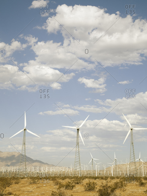 Group Of Industrial Wind Turbines Fans In Mojave Desert