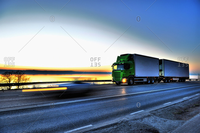 Long-distance lorry against sky