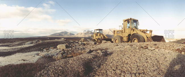 Bulldozers in desert, Canary Islands, Spain