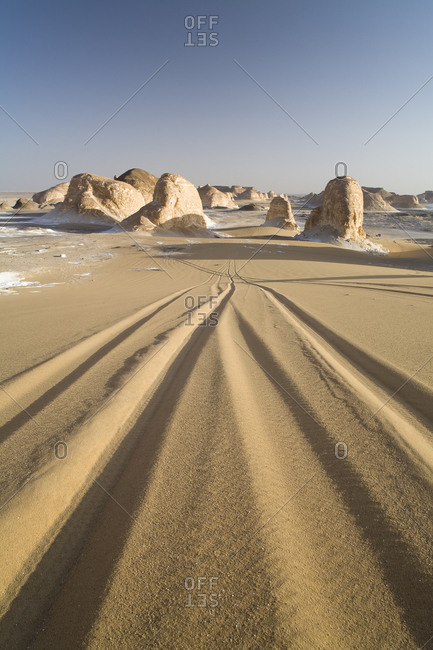 Jeep Tracks Leading To Rock Formations At The Entrance To The White Desert