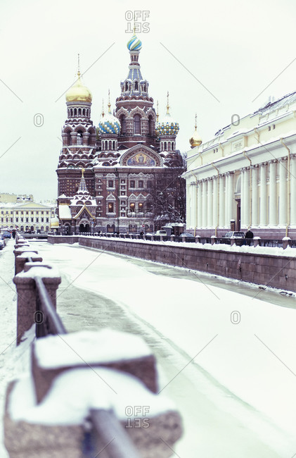 Ornate church on snowy city street, St Petersburg, Russia