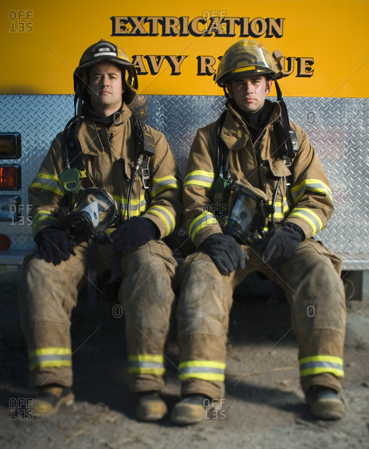 Portrait of two firefighters