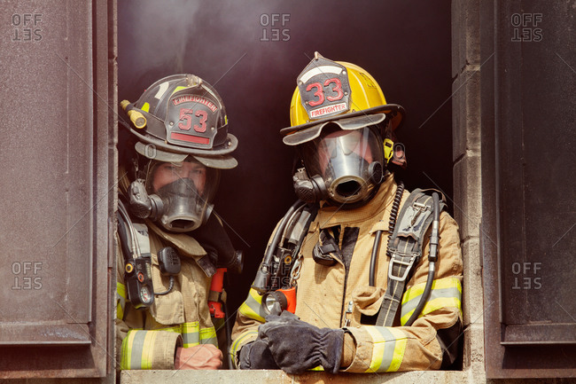 Firemen wearing protective gear