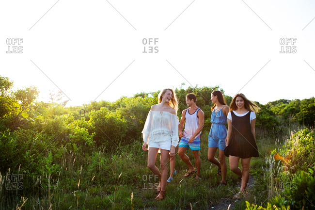 Group of people walking in nature
