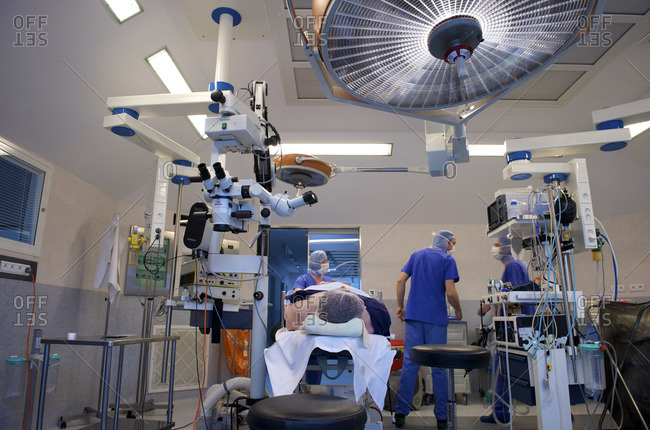 Operating room with doctors and patient on the table