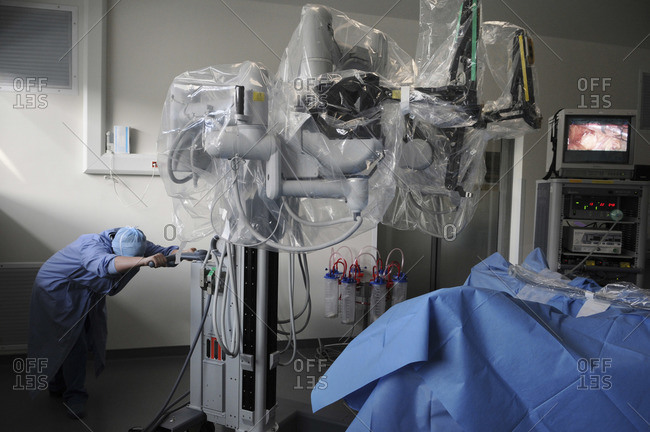Surgeon using a robotic surgical system to facilitate complex surgery