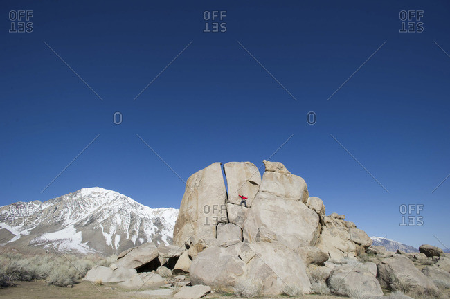 A man sport climbs in Bishop, California