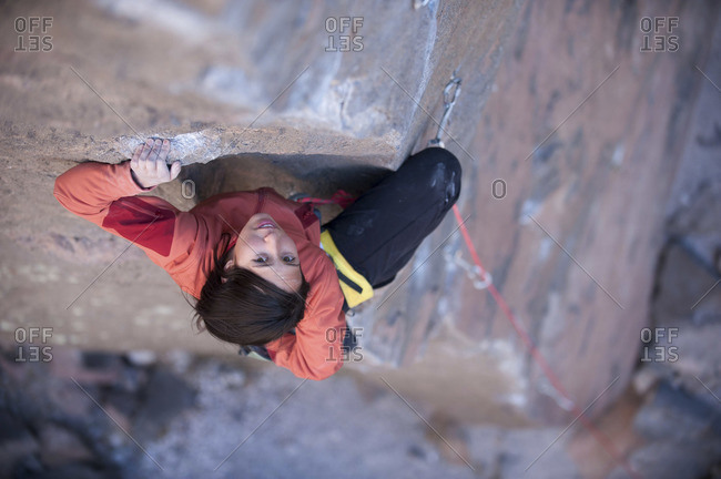 A woman climbing Gorgeous in Owens River Gorge, Bishop, California