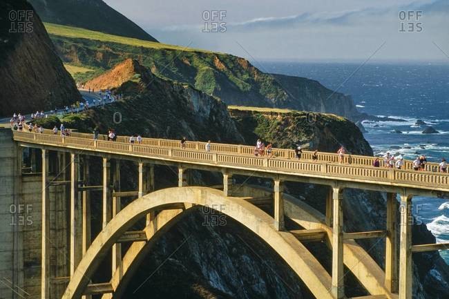 Big Sur Marathon runners on Bixby bridge, Big Sur, California