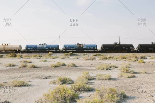 Freight wagons of a train crossing the desert