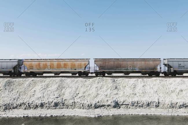 Freight wagons of a train crossing the desert