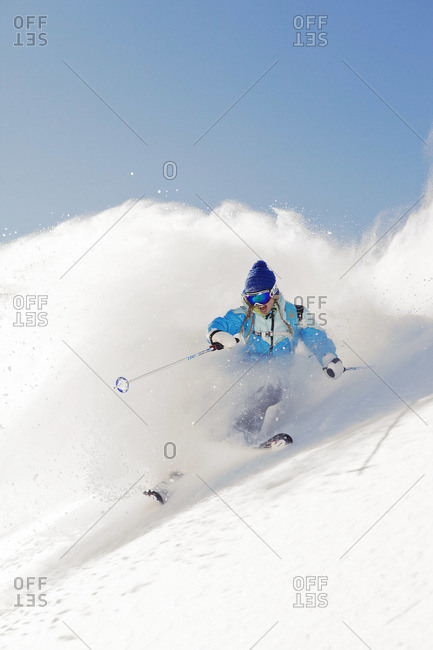 Skier skiing downhill