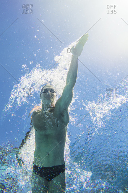 Underwater view of athletic swimmer