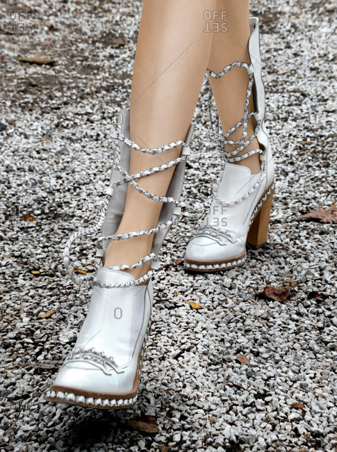 Woman in Silver Lace up Shoes
