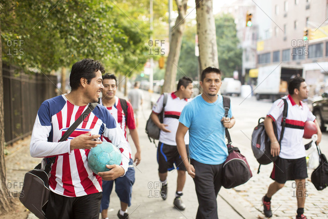 Soccer team walking on street