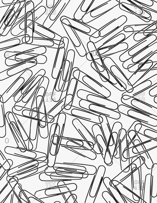 Metal paperclips on a white background