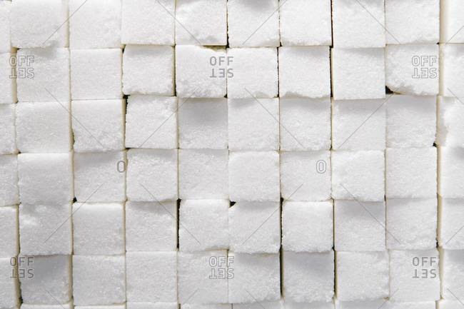 Wall of stacked sugar cubes