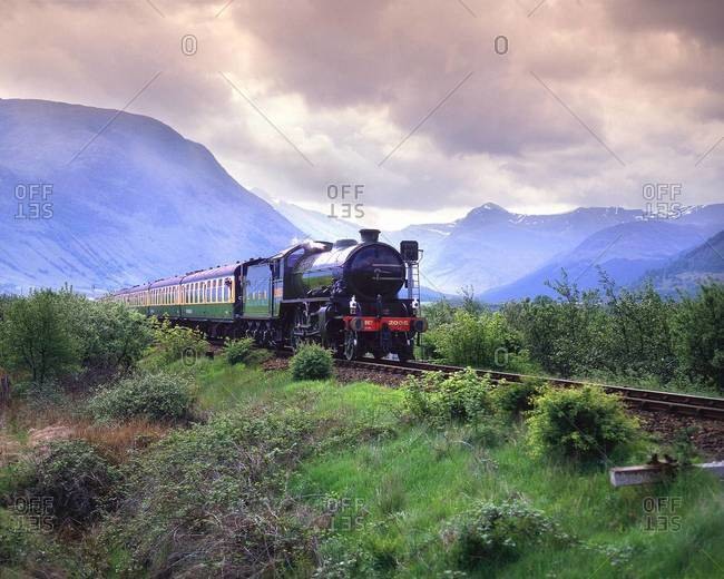 Steam train passing through in Scotland
