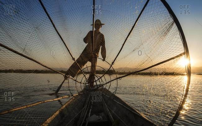 Outline of leg rowing fisherman on the Inle Lake, Myanmar
