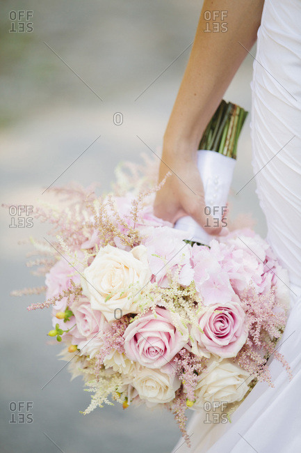 Close-up of bride holding bouquet of flowers, Toronto, Ontario, Canada
