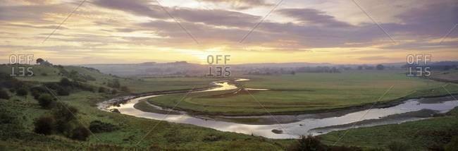 Meandering River Aln at sunset, Foxton, near Alnmouth, Northumberland, England, UK