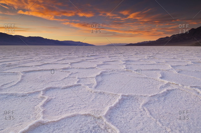Sunset at the Salt pan polygons, Badwater Basin, 282ft below sea level and the lowest place in North America, Death Valley National Park, California, United States of America, North America