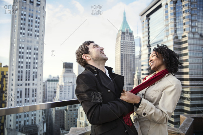Couple having fun on rooftop